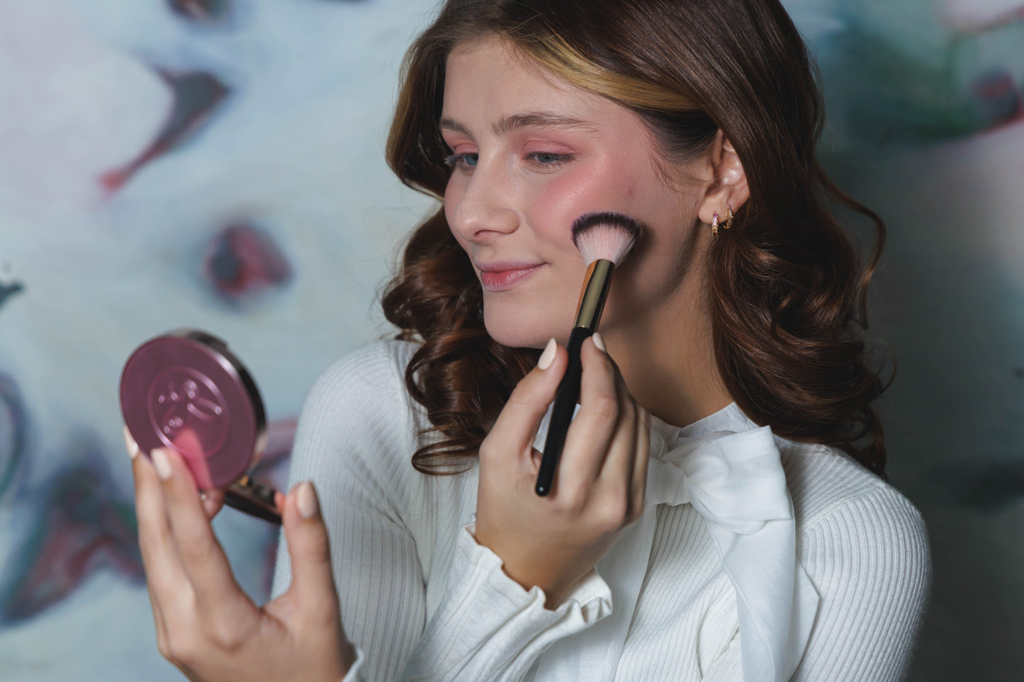 Darling - A soft peach infused with shimmer for a sun-kissed, luminous finish.